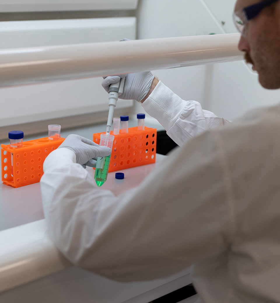 A man working in a lab.